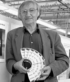 Fermilab's Muzafer Atac shows a prototype silicon detector for CMS