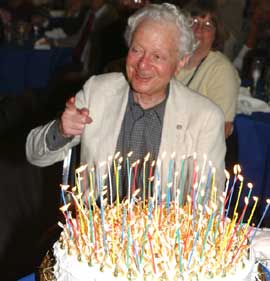 Leon Lederman, facing the heroic task of blowing out 80 candles. (He did just fine!)