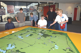 Students from the Birmingham, Alabama school began their tour with the site model on the 15th Floor of Wilson Hall.