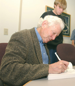 Leon Lederman signed copies of his book,The God Particle, for students from Altamont School during their visit to Fermilab.