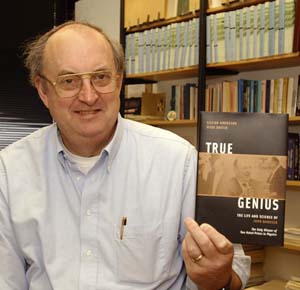 Fermilab theorist Bill Bardeen with a copy of the new biography of his father. John Bardeen is the only two-time winner of the Nobel Prize in Physics, sharing the 1956 and 1972 awards.