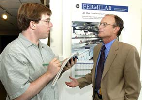 Science Magazine reporter Charles Seife questions Fermilab director Michael Witherell.