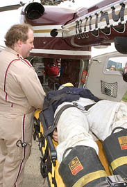 A crash dummy is transferred to the chopper