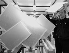 Russian physicist Andrei Schukin looks over a muon panel for DZero